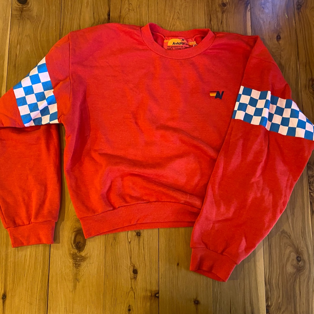 Aviator Nation Limited Edition red crewneck with blue and white checkers sleeves